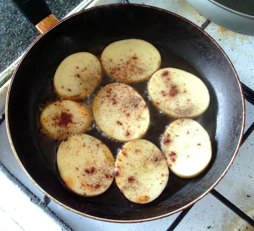 Frying chilli spiced potatoes
