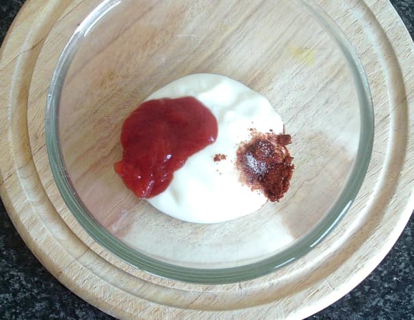 Basic chilli sauce ingredients are combined in a bowl