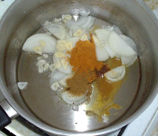 Onions, garlic and spices are sauteed in vegetable oil