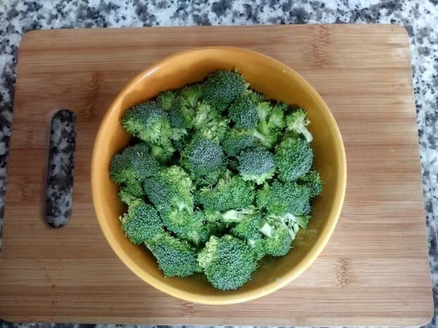 Chop the broccoli into florets and set them aside. Watch the video above if you need help learning how to cut the broccoli into florets.