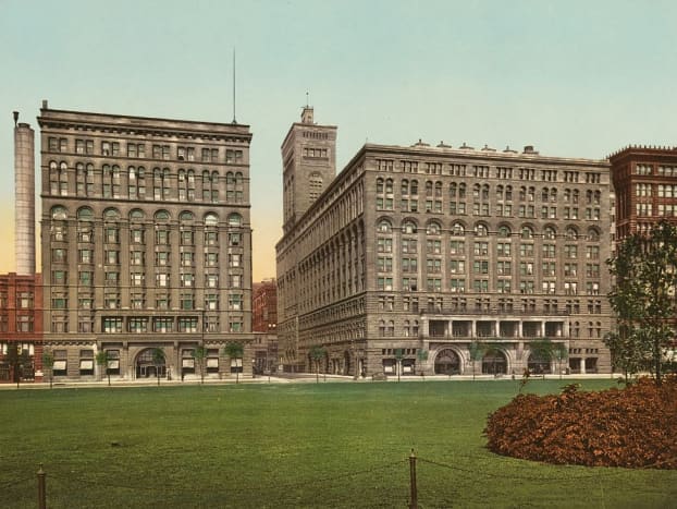 Auditorium Annex (left) and Auditorium Building (right) in a hand-tinted 1900 postcard.