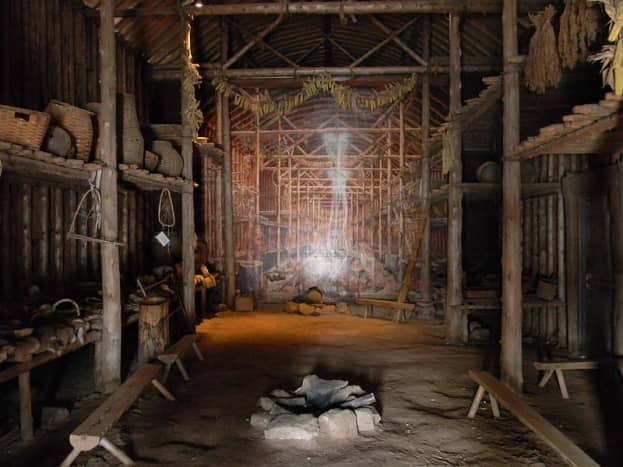  Inside a 15th century Iroquois Longhouse in Ontario, Canada. Notice the wooden benches used.