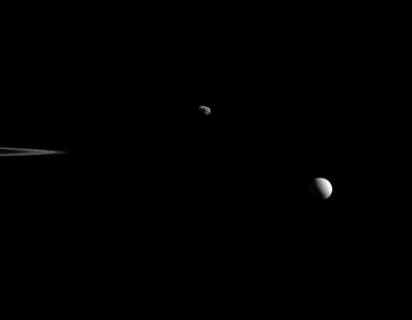 Janus (left) at 598,000 miles away and Mimas (right) at 680,000 miles away, taken on Oct. 27, 2015.