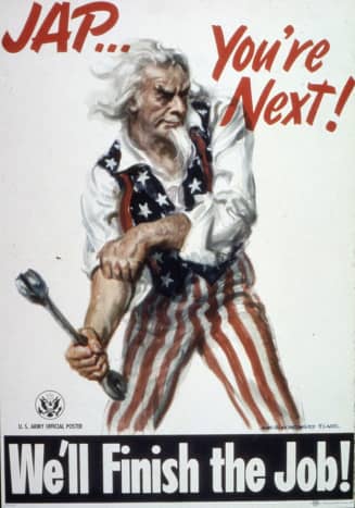 Uncle Sam rolling up his sleeves getting ready to defeat Japan after the surrender of Germany. 