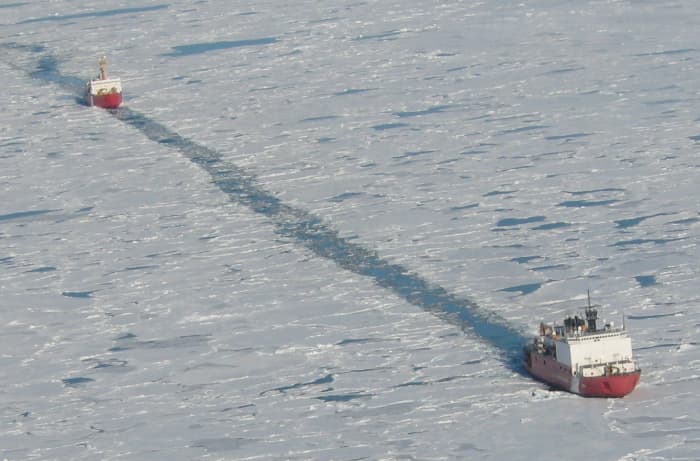 USCGS Healy and CCGS St. Laurent cooperate in a sonar survey of the Arctic Ocean seafloor, despite the clashing territorial claims the two nations stake in the High Arctic.  Image courtesy NRC.