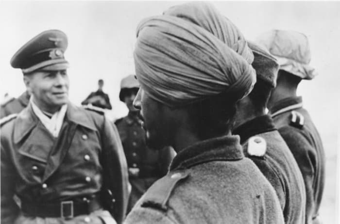Famed German General Erwin Rommel inspecting Indian troops under his command. Note the traditional Pagri turban headdress, worn by the soldiers.