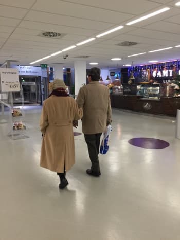 Mum leaving the hospital with dad after her first chemotherapy session in Christmas 2015.