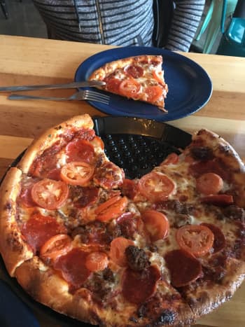 You can choose from one of the speciality pizzas or create your own. What makes this pizza so good is the dough&mdash;they use brewing yeast. This lovely creation is the Italian greyhound, and it is fantastic. 