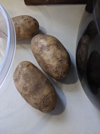 Start with three long potatoes.