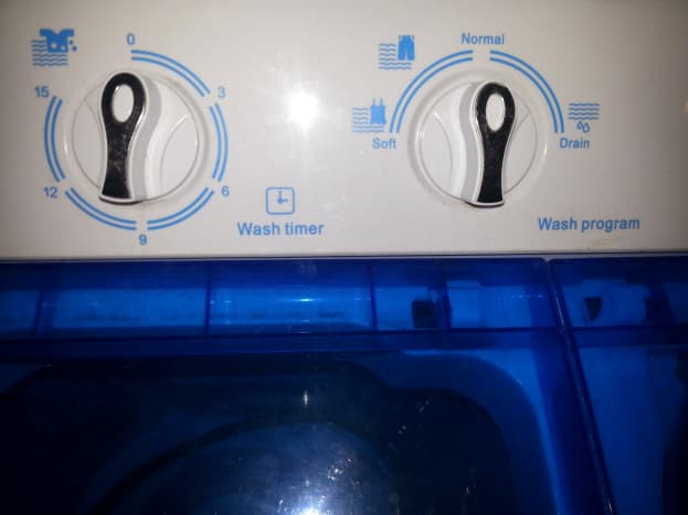 The Wash Program options on my portable washing machine are Soft and Normal. Jeans and towels are washed in a normal load. Other similar machines may offer Normal and Heavy. Either way, the job gets done.