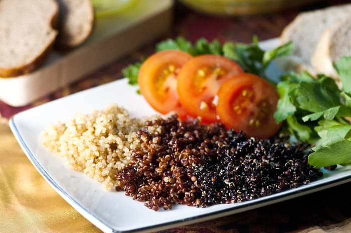 Cooked white, red, and black quinoa