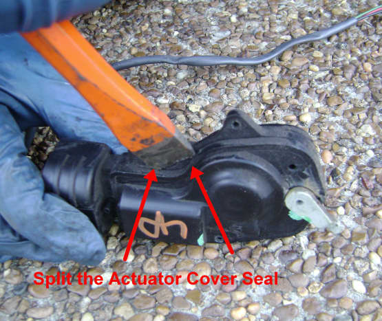 Opening the Cover on the Toyota Camry Door Lock Actuator Cover