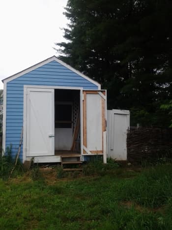 The outside of the coop we built for our chickens. The door to the run is to the right.