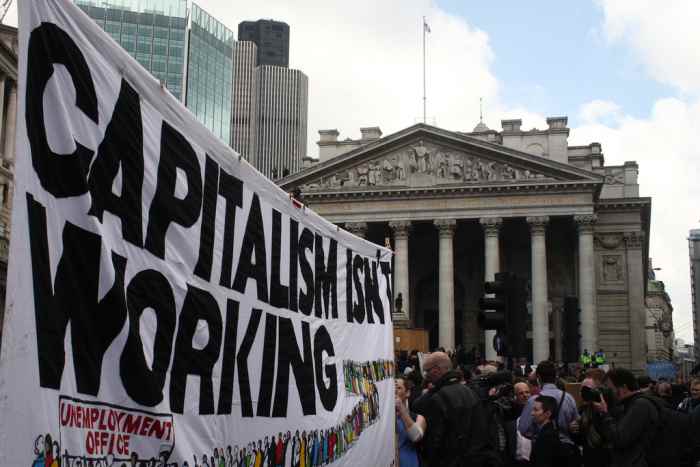A banner reading "Capitalism isn't working" (a pun on the Conservative election poster "Labour isn't working") at the G20 Meltdown protest in London on April 1, 2009.