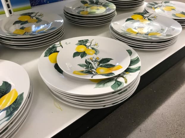 Plates and cutlery for everyday use are great finds at a dollar store. 