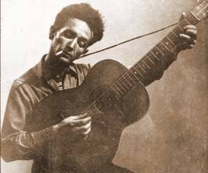 Woody Guthrie and Bob Dylan both loved small-body, all-mahogany guitars.