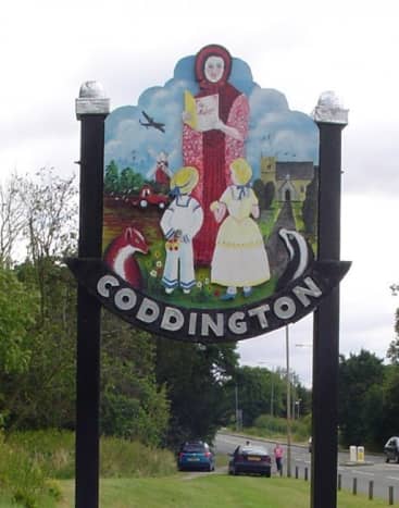 The entrance to Coddington Village depicts Constance Penswick Smith, whose father was the vicar of the parish church. 