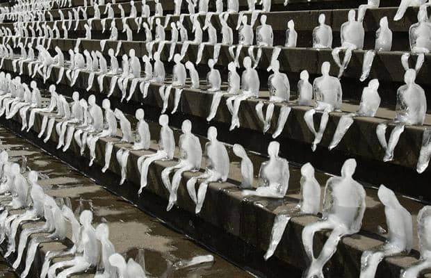 Ice sculptures (around 1,000) by Brazilian artist Nele Azevedo melt on the steps of Berlin's Concert Hall at the Gendarmenmarkt. 