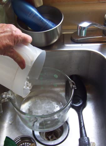 Add lye to water - you may have to stir.