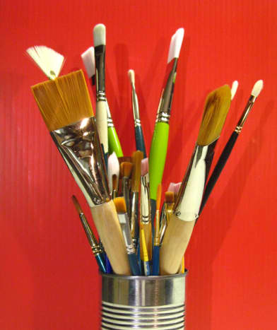 Some of my brushes, kept tip-up in a can.
