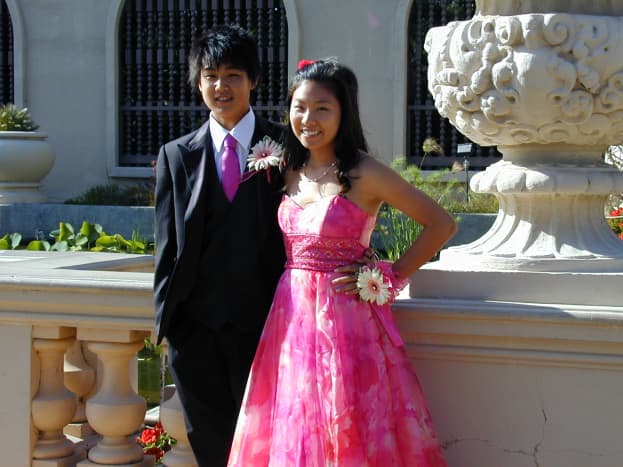 Brian Lee and his date, Rachel, look smashing in their matching Gerber daisy corsage and boutonniere.