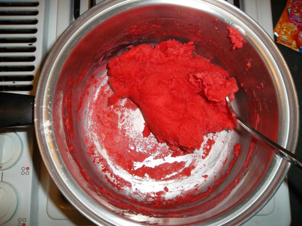 It only takes 1-2 minutes of stirring for the playdough to form.