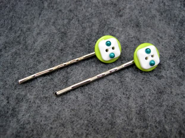 I added self-adhesive rhinestones to this pair of button hairpins.