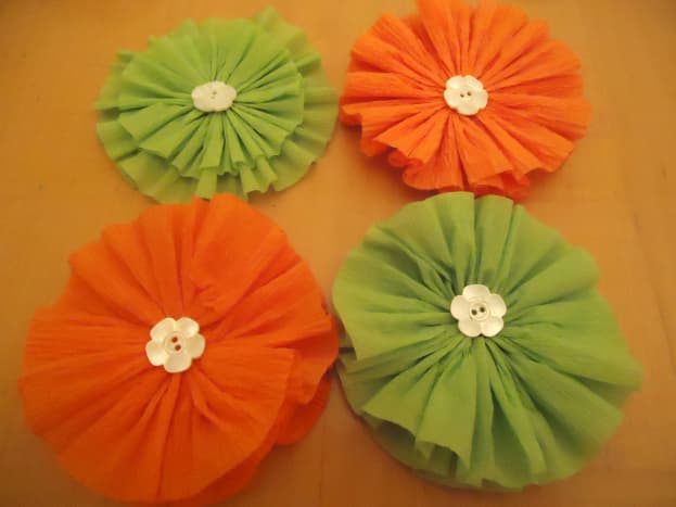 Rosettes embellished with buttons.