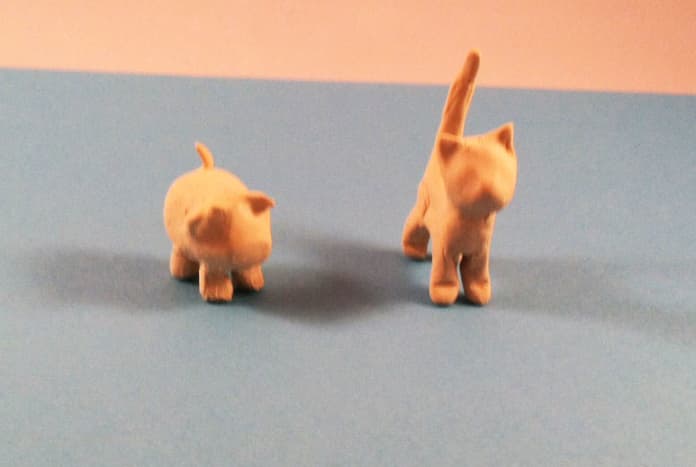 A cat and a pig made from Crayola Air-Dry Clay