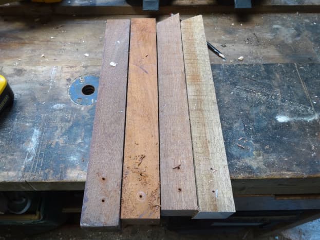 Four lengths of salvaged hardwood teak to be recycled as for the legs for the stand.