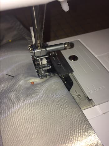 Take your time while sewing so that your stitches are straight and the margins are uniform. When turning corners, the needle should be down in the fabric. Lift up the foot, turn the fabric and then lower the foot to a sewing position.