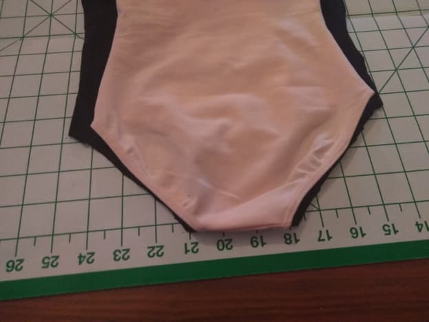Trim the sides (I'm using the pink suit as a template).