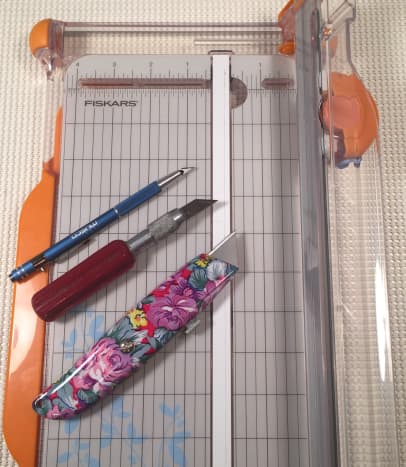 Paper trimmer with craft knives.