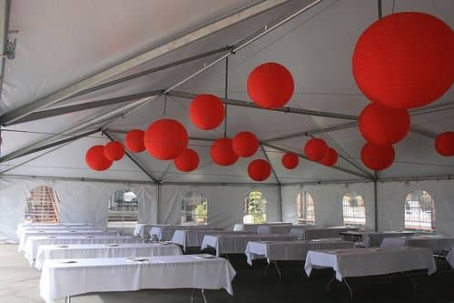 This very chic, no-liner frame tent features cathedral walls and funky ball lights. 