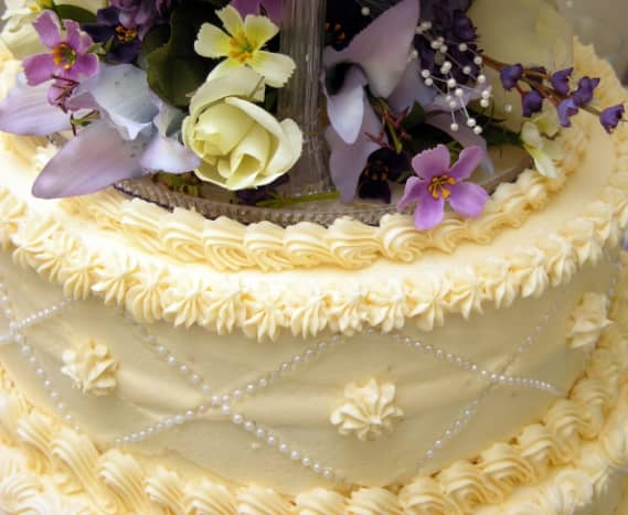 Delicate Hues for a Spring or Early Summer Wedding: Fresh Flowers Decorate a Special Spring Wedding Cake.
