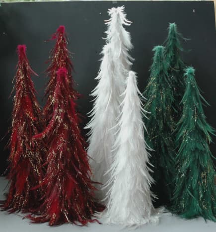 To make thinner or shorter trees like in this little forest, carve away portions of the floral cone before decorating.