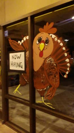 This is my buddy, Trixie Turkey. He arrives during the month of November and hangs out until the end of the month. This scene shows him holding a hiring sign