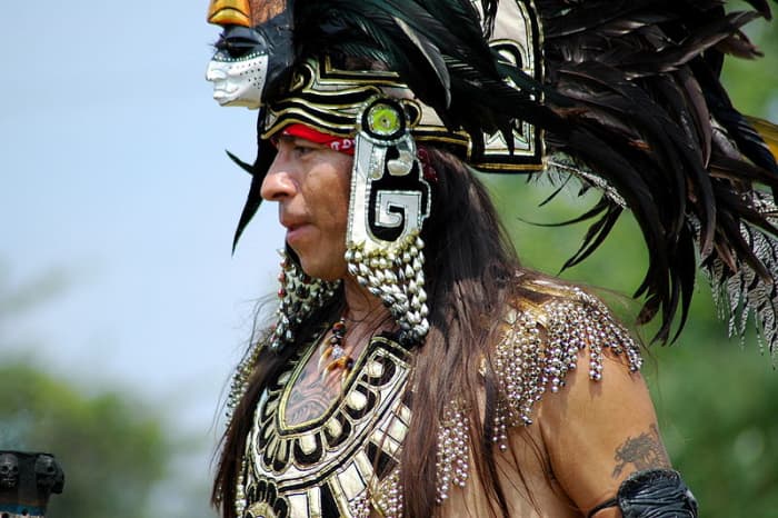 Aztec individual attending a pow wow.