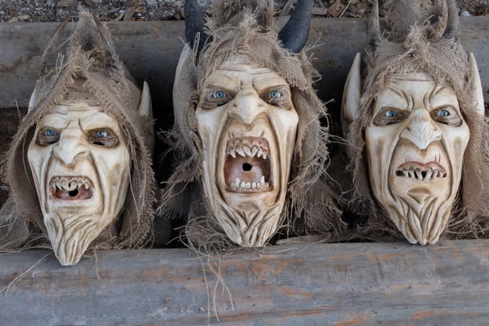 Three modern Krampus masks