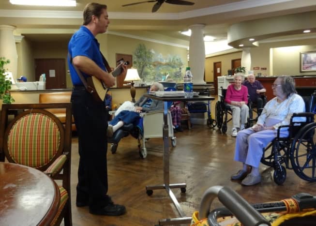 Chris Lemoine visits the nursing facility every week to sing for the residents.