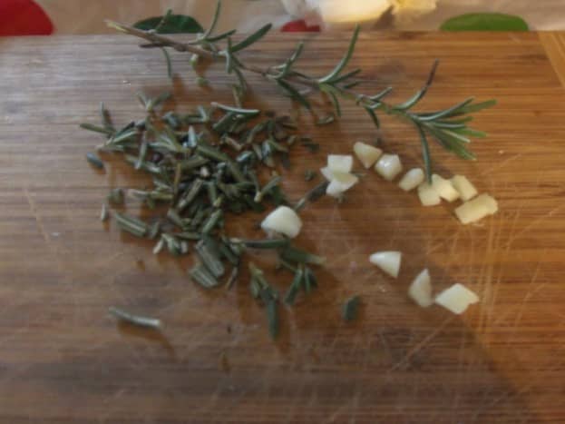 Chop your garlic and rosemary into small, manageable pieces. 