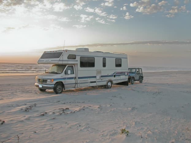 Watch the sunrise on the Gulf of Mexico when you park your RV right on the beach in Padre Island National Seashore.