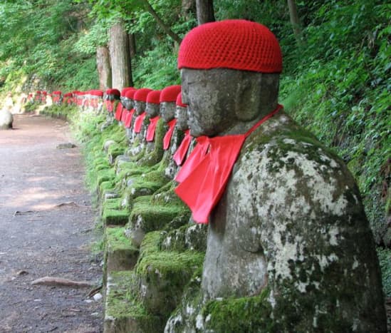 Jizo statues, watching over Kanmangafuchi abyss.
