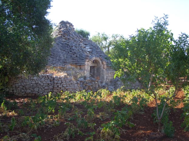Trulli are unique to the region of Puglia. This is an old original-style trullo next to our property.