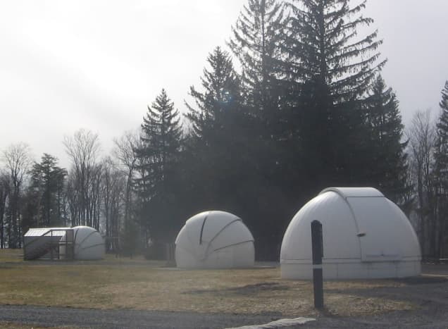 Observatories are for rent in the park's astronomy field.