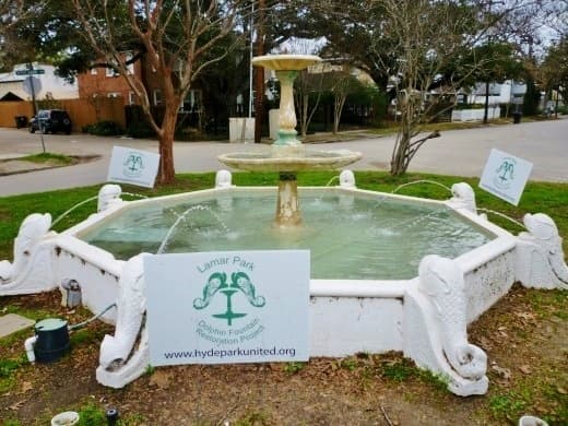 Antique dolphin fountain in need of repair