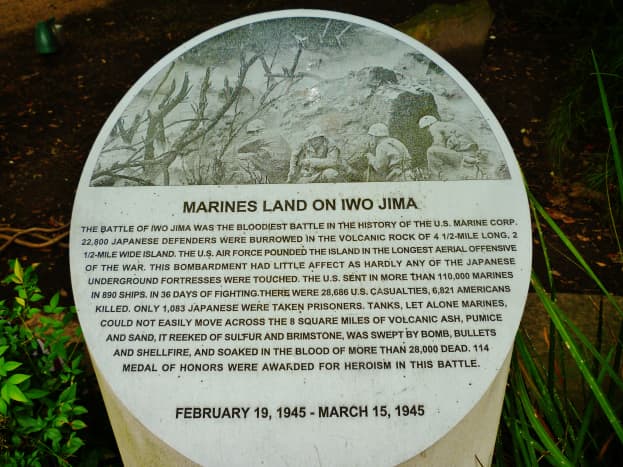 Marines land on Iwo Jima information on a bollard