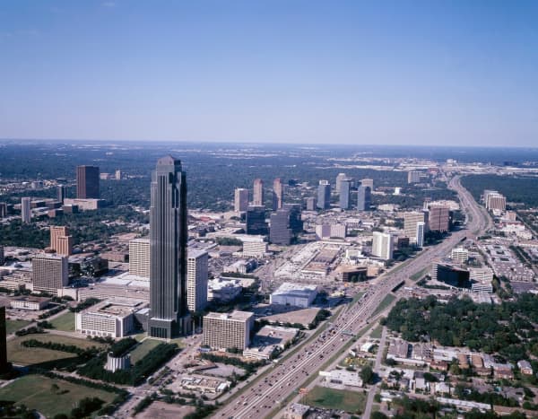 The tallest building in this photo is the Williams Tower (formerly called the Transco Tower.) Note the curved water wall opposite the grassy area of the building near the bottom left of the photo.