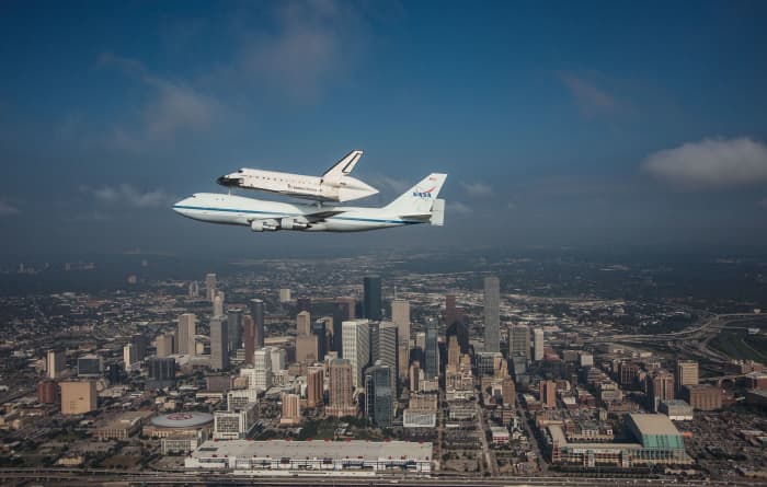  Space Shuttle Endeavour is ferried by NASA's Shuttle Carrier Aircraft (SCA) over Houston, Texas on September 19, 2012