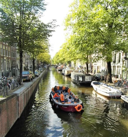 An open boat tour of Amsterdam.